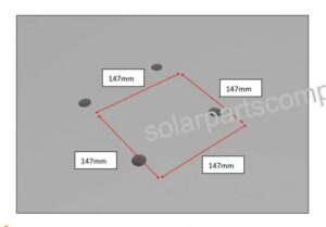 Drilling anchor holes using base plate as template during ZAM solar carport installation
